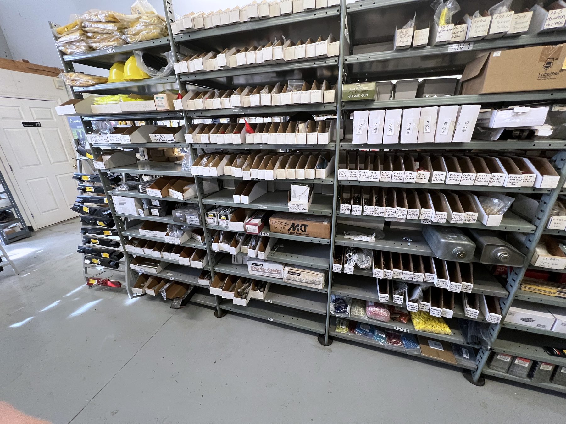 Aisle of stocked parts shelving at Albert L. Crush Co.